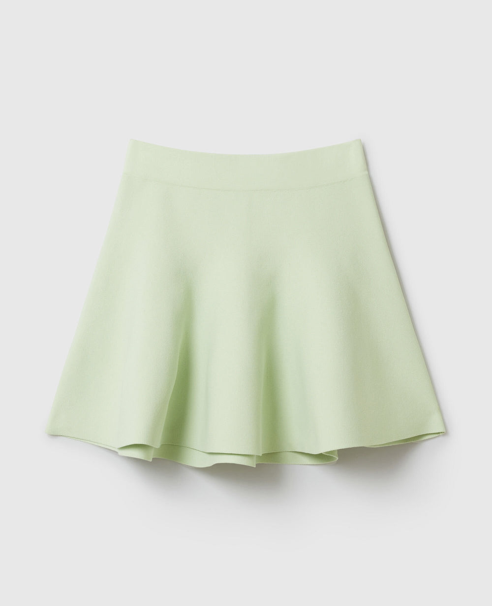 Compact Knit Peplum Mini Skirt