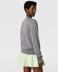 Compact Knit Peplum Mini Skirt