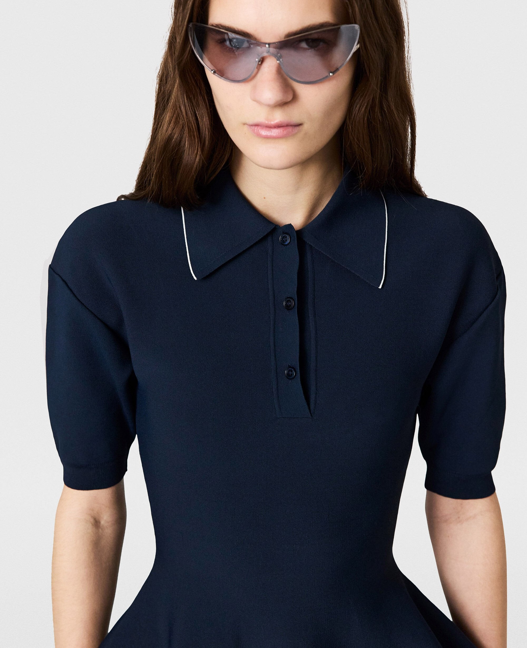 Compact Knit Peplum Polo Top
