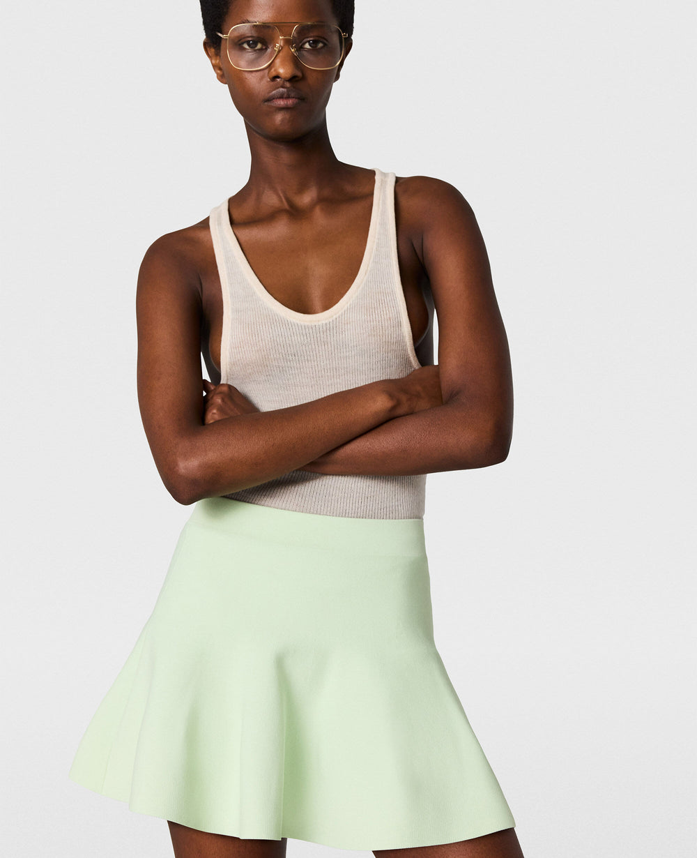 Compact Knit Peplum Mini Skirt